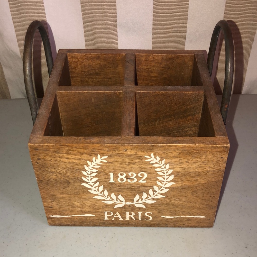 Solid wood divided box with metal handles.